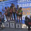 Podio con los mejores del 10 K, junto al concejal de Deportes, la dama de honor de las Hogueras, Alba Martínez, y el presidente de Adifia, en sill...