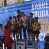 Los ganadores de la prueba de 10 K, chicos y chicas, con el concejal de Deportes 