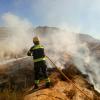 Extinción de incendio por bomberos del SPEIS