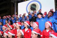 El alcalde con la selección del Hércules cantando villancicos