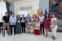 Imagdel acto de presentación del sello postal de  Alicante Capital Española de la Gastronomía que recorrerá España y Europa