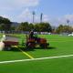 Trabajos de instalación de césped artificial en el campo de fútbol del antiguo Hipódromo, en el Tossal.