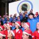 El alcalde con la selección del Hércules cantando villancicos