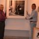 Tomás Martínez, J. A. Cerdán y Gabriel Díaz, en los preparativos de una de las exposiciones de FotoArte